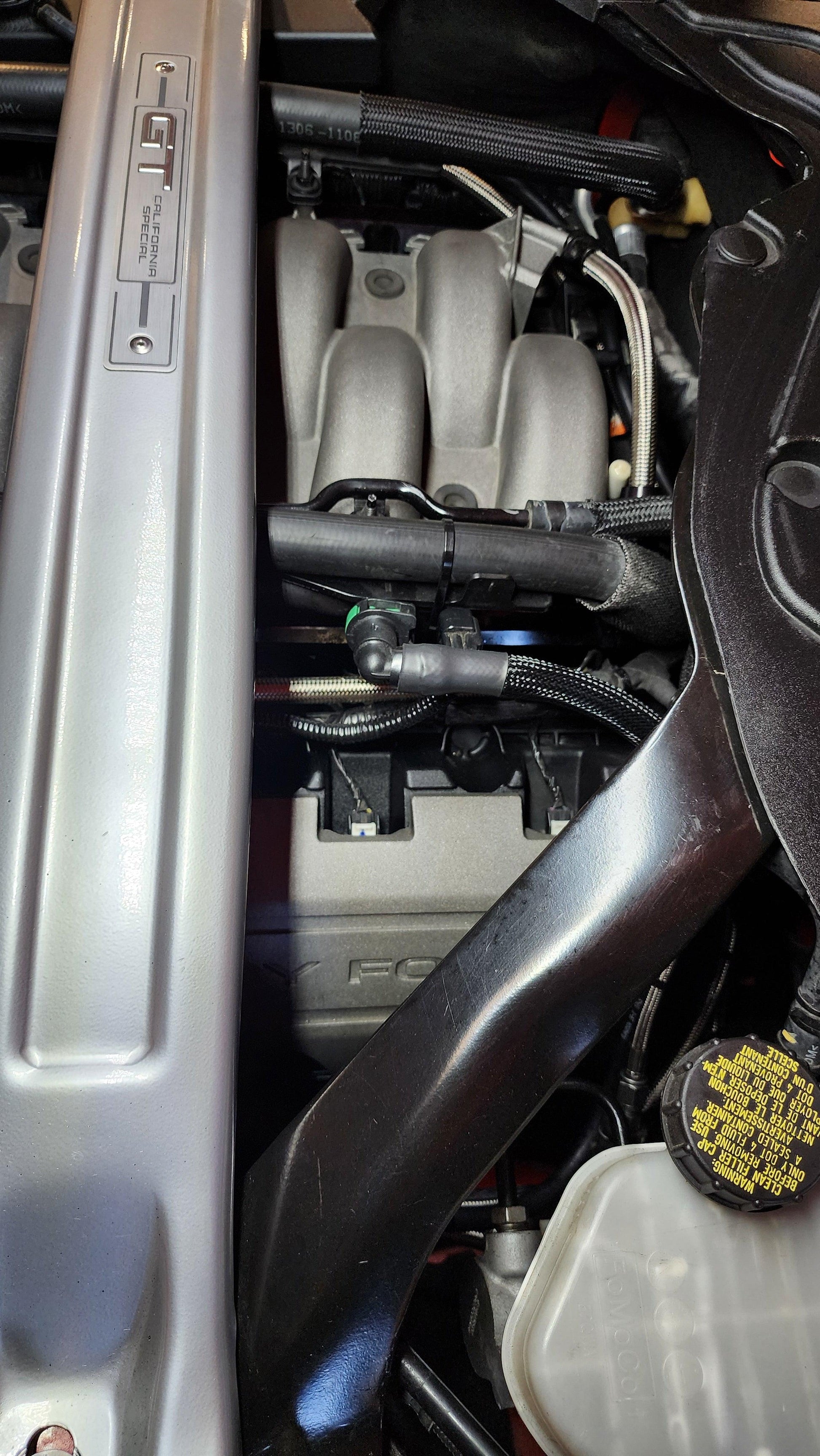 Showing an installed picture of the Nocturnal Automotive / Auto EVAP solenoid relocation kit, 2015-2017 mustang gt gen 2 coyote, with gen 3 2018+ intake manifold upgrade